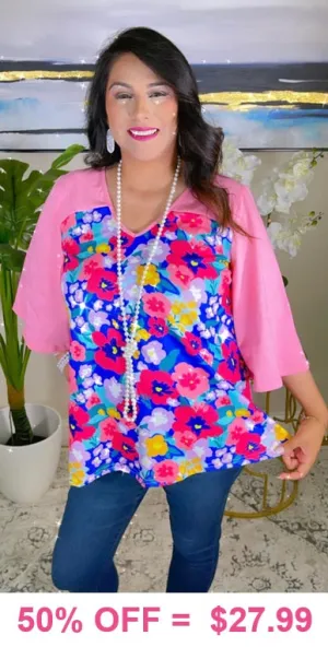 Blue Floral top with pink bell sleeves
