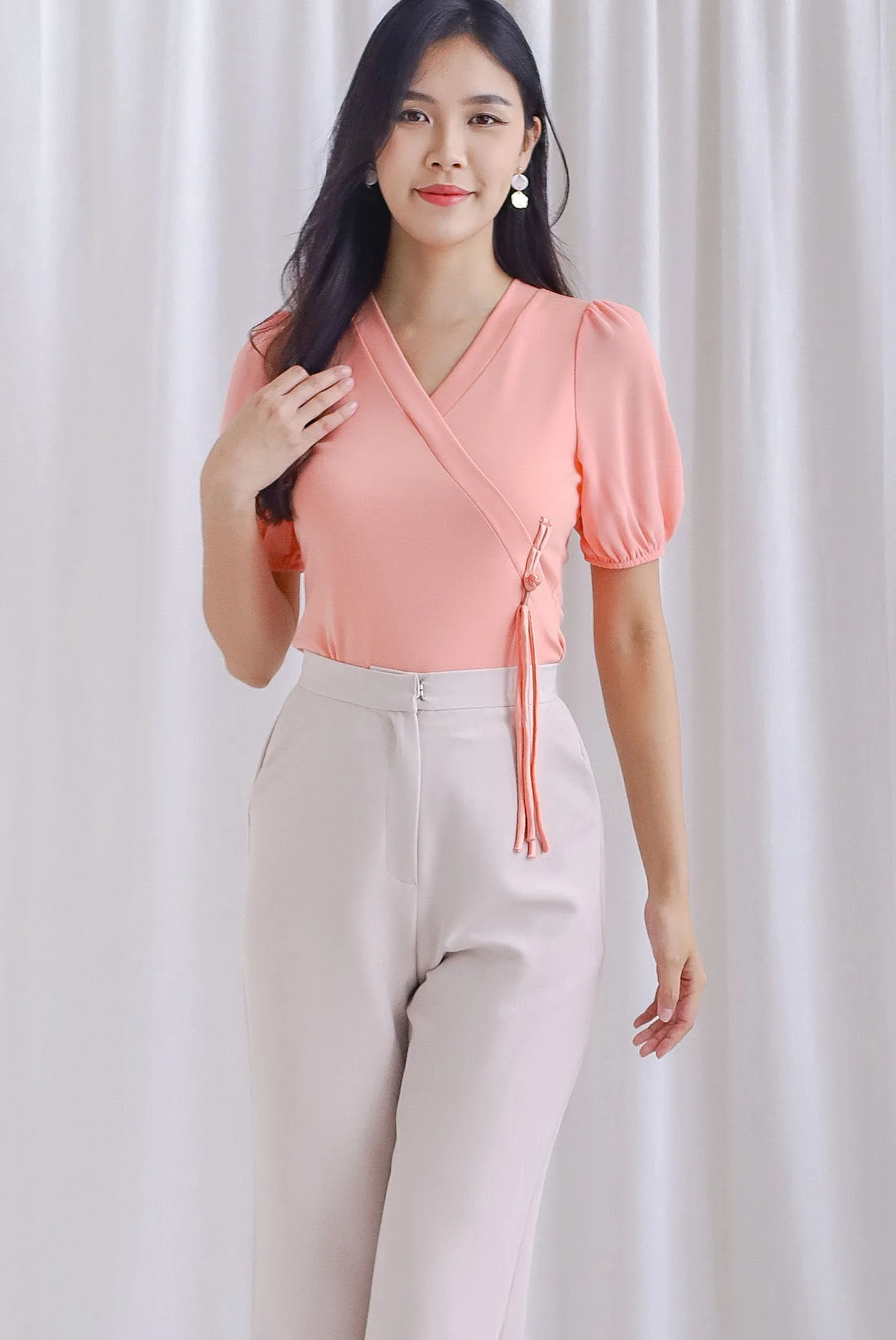 Chang Sleeved Oriental Tassel Button Top In Peach