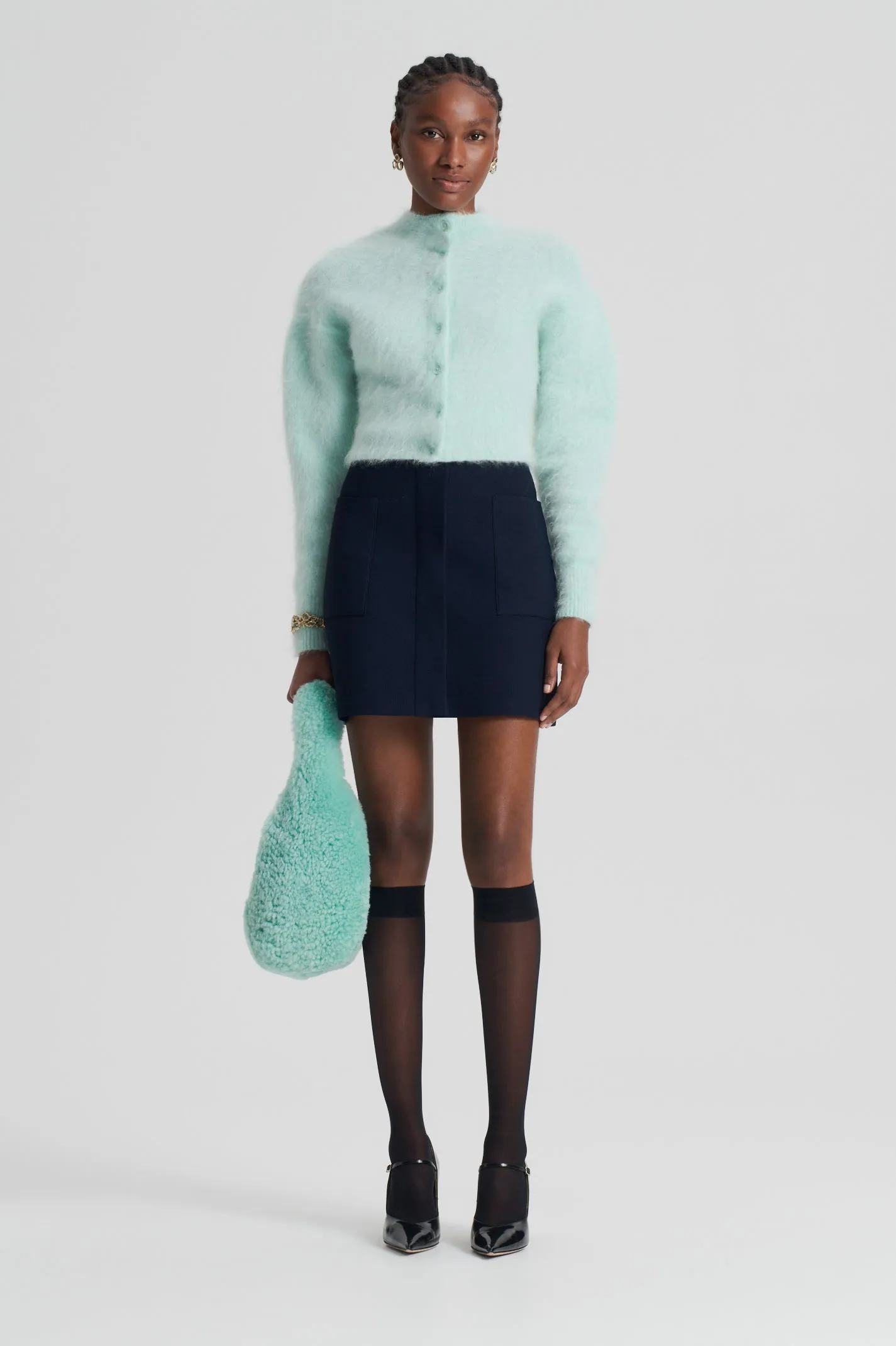 CREPE KNIT POCKET MINI SKIRT - NAVY