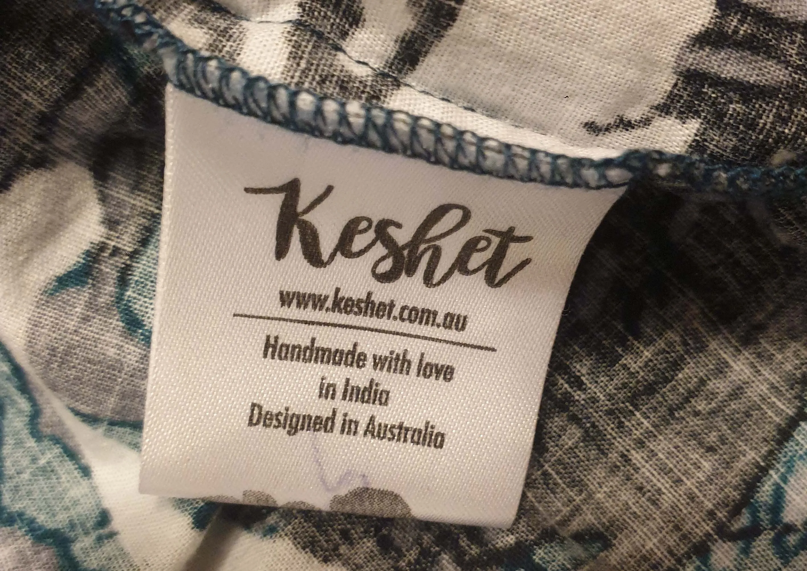 Keshet unique print oversize shirt size SM, best fits AU12