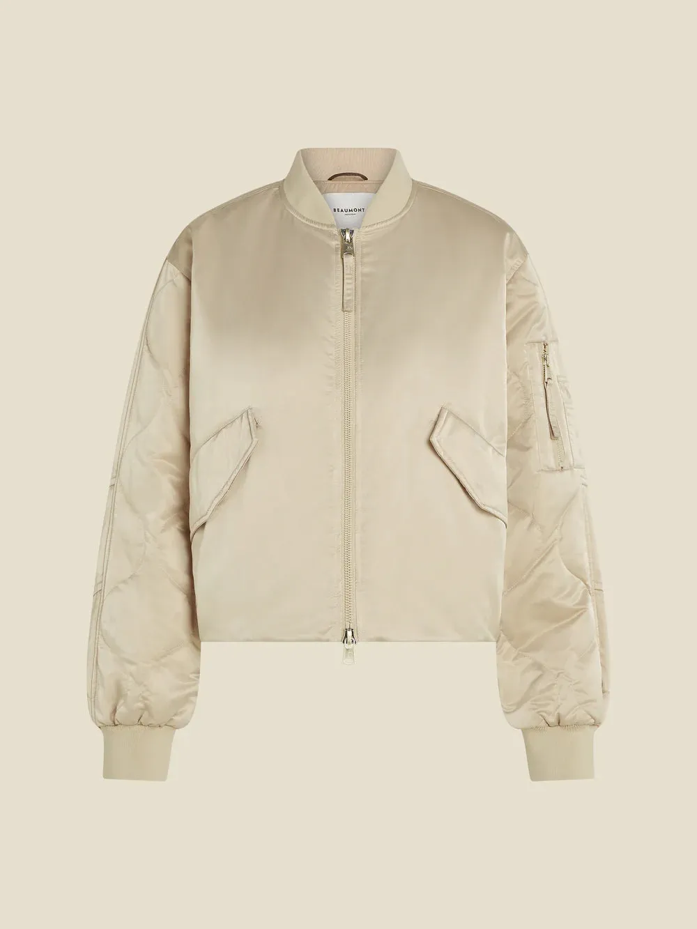 Light gold bomber in crinkled padded fabric