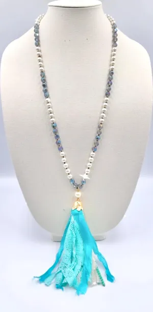 Pearl necklace with turquoise tassel