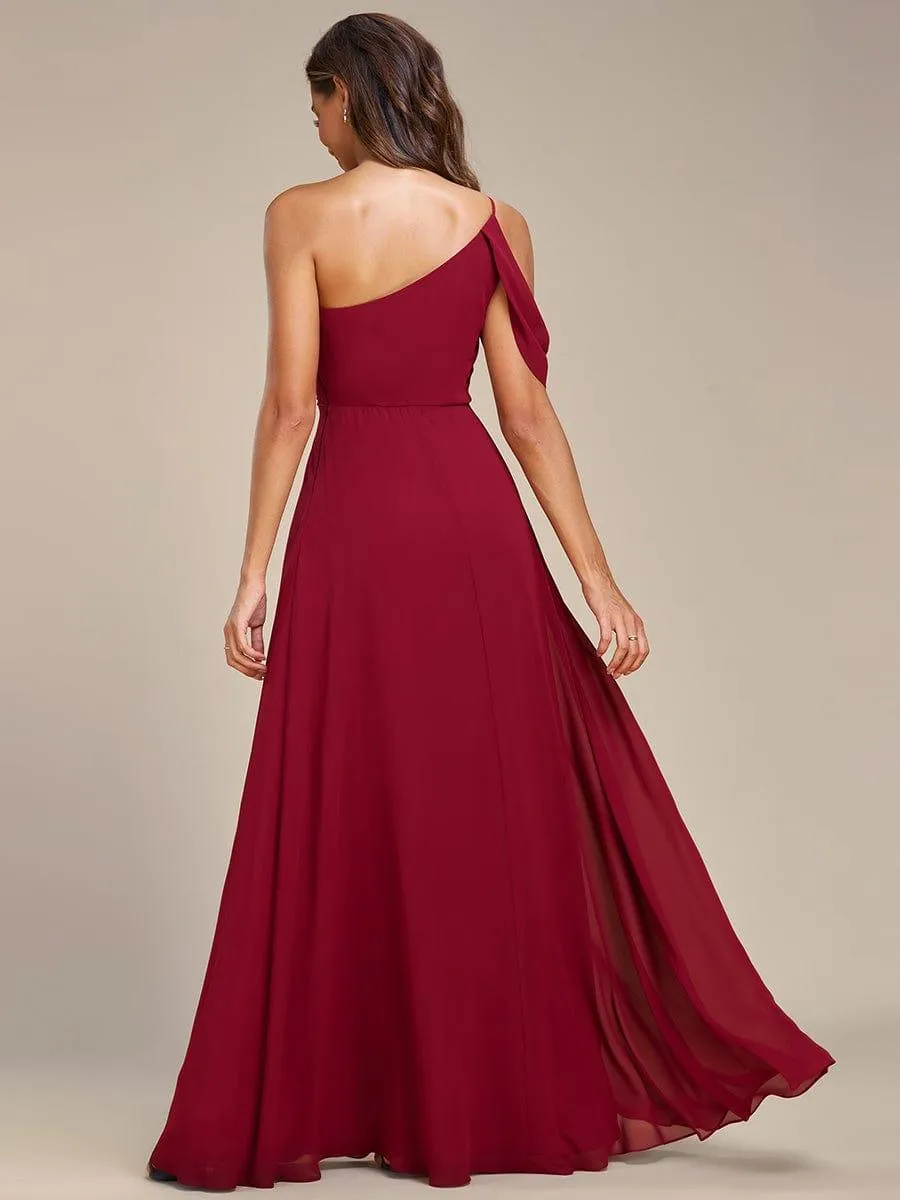 Robe asymétrique mousseline plissée dos nu à une épaule